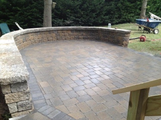 New stone patio, installed by Dependable Landscaping