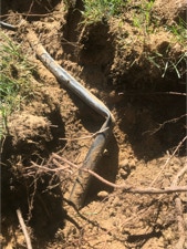 irrigation pipe that's bent and in need of repair