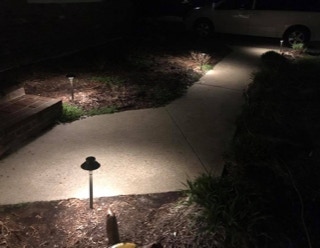 lighted walkway at night